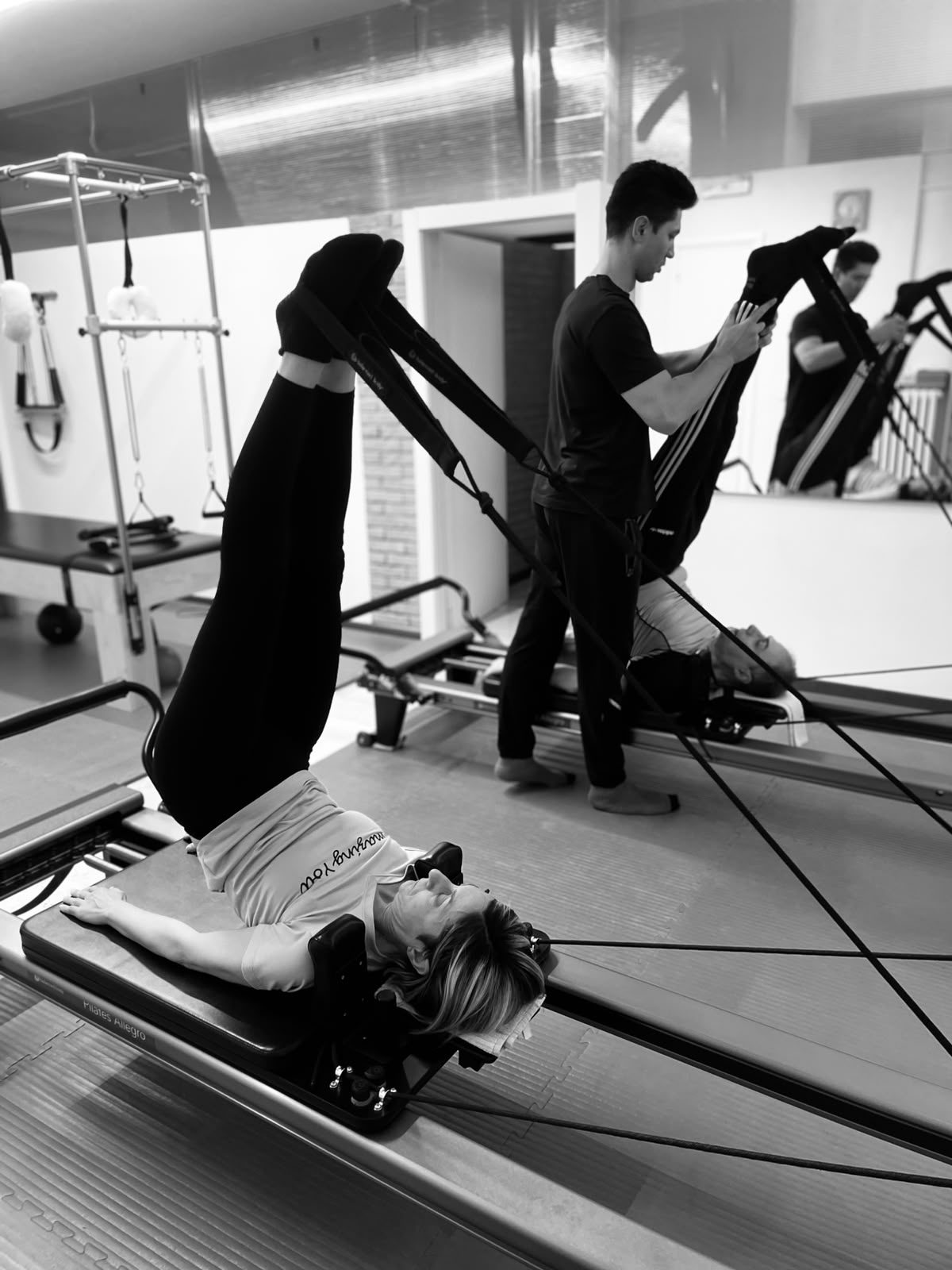 Lezione di Pilates Reformer con l’istruttore a Modena