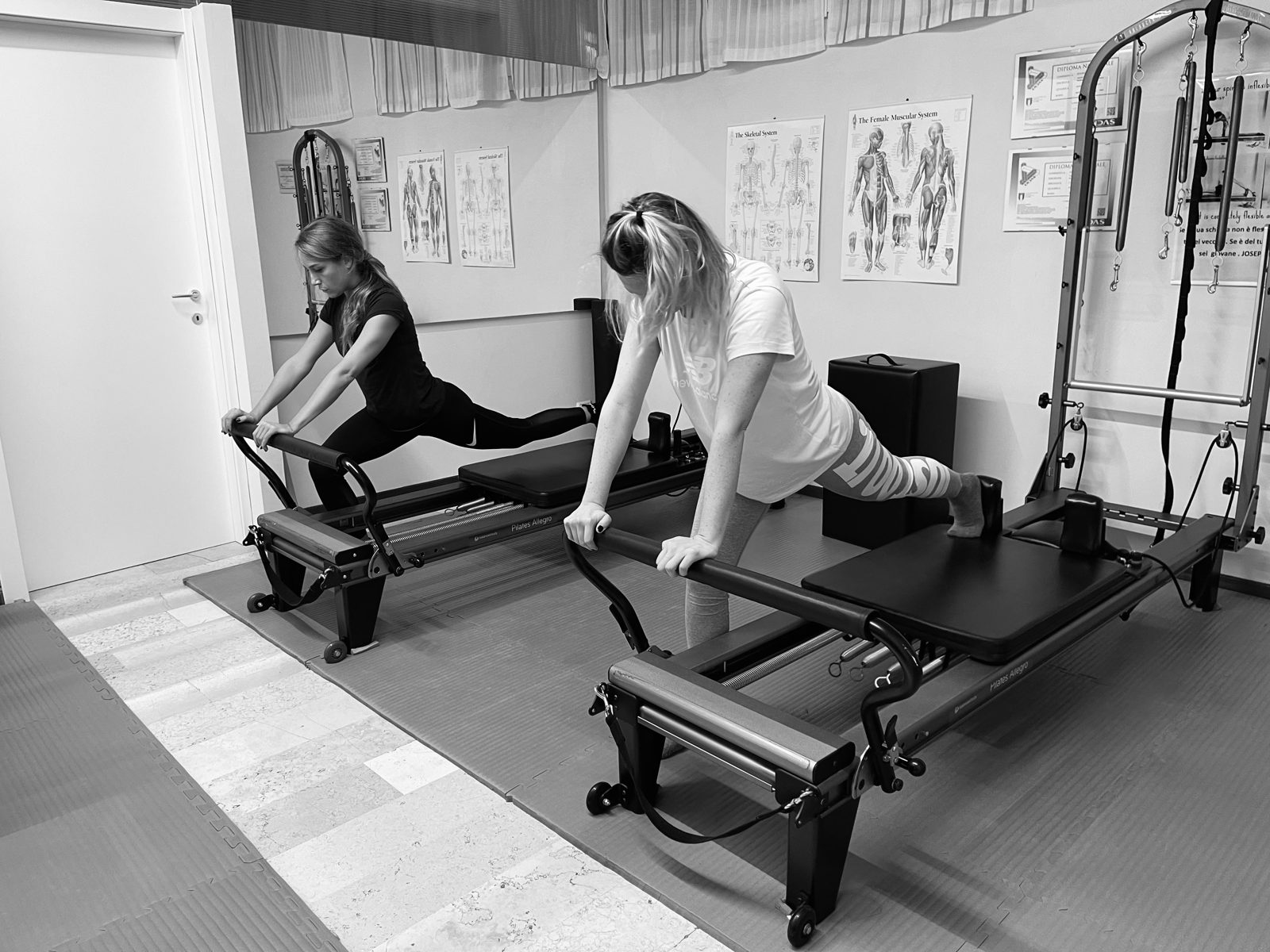 Lezione di Pilates sui Reformer nello Studio Pilates Gardenia Blu a Modena